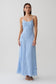Woman wearing a blue floral lace midi dress.