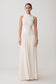 Woman wearing a white high neck modal maxi dress.